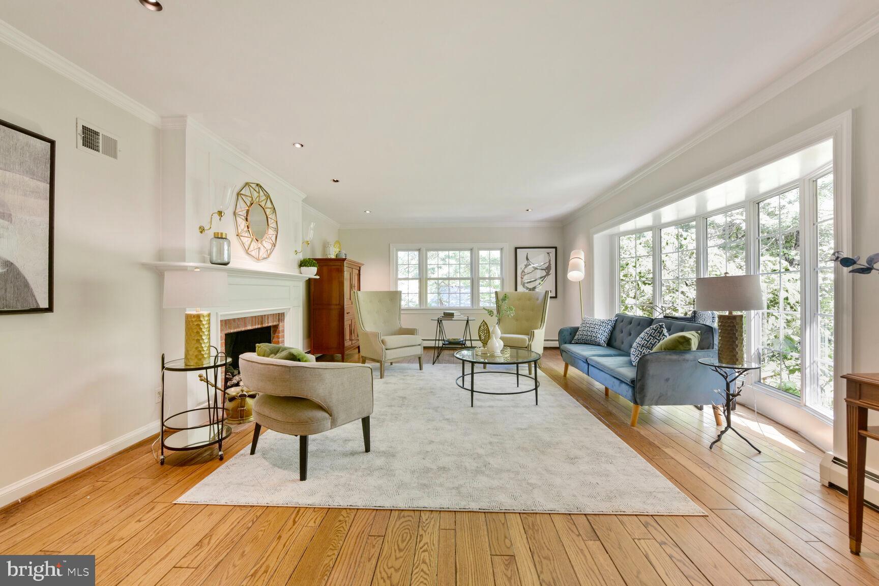 9111 Hamilton Drive Fairfax, VA 22031 - Photo 20 of 63 a living room with furniture and a fireplace