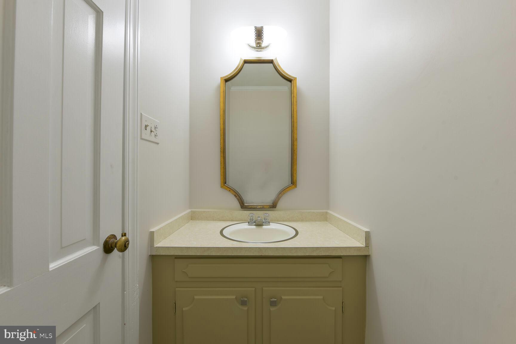 9111 Hamilton Drive Fairfax, VA 22031 - Photo 24 of 63 Powder room off the office/den