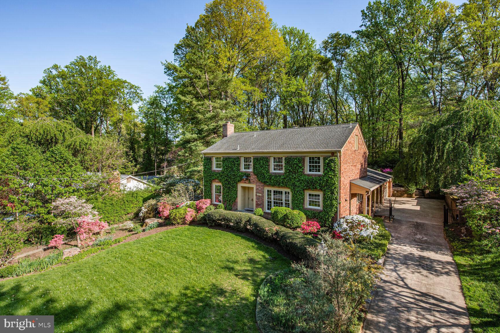 9111 Hamilton Drive Fairfax, VA 22031 - Photo 3 of 63 a front view of a house with garden