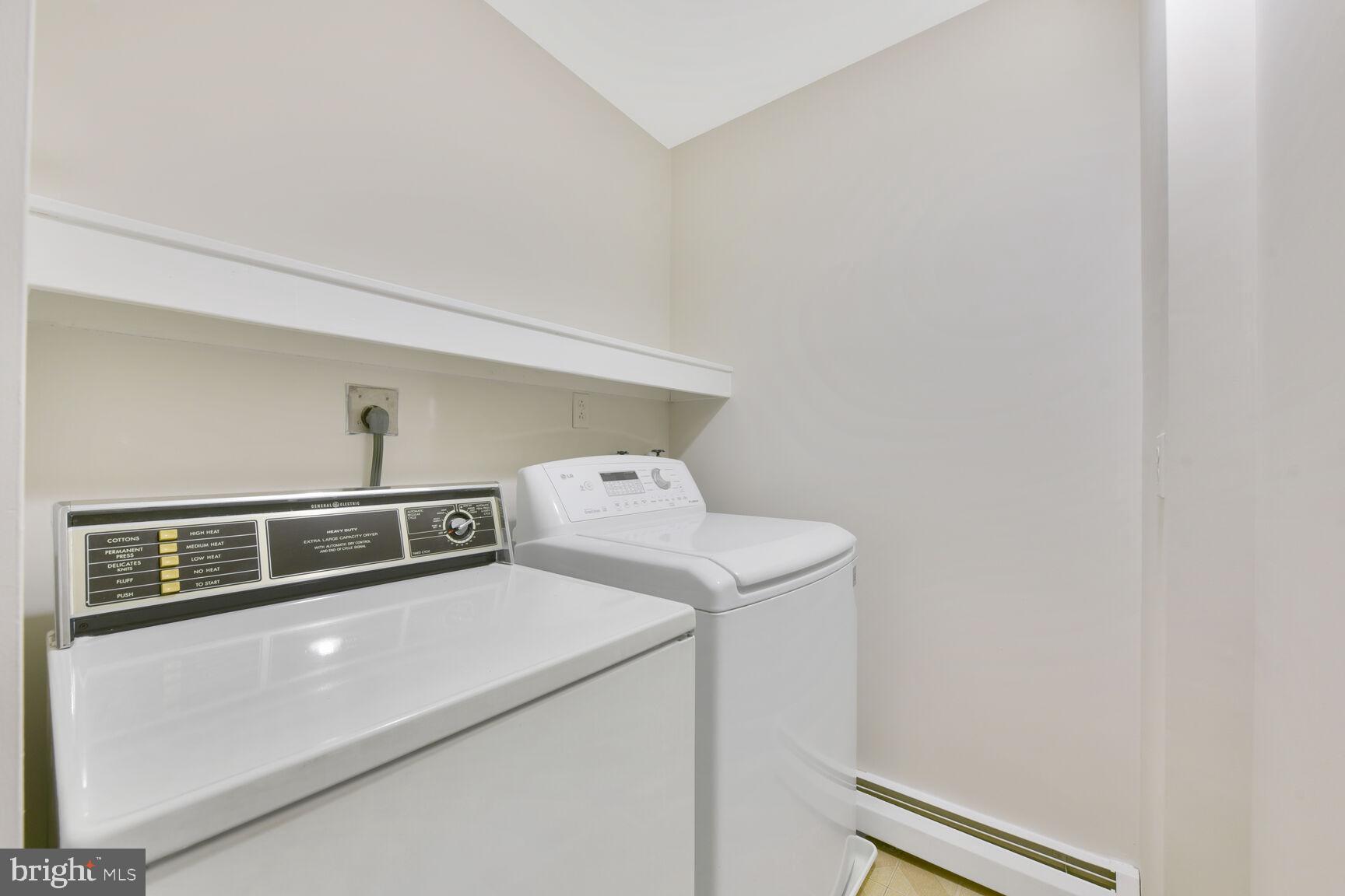 9111 Hamilton Drive Fairfax, VA 22031 - Photo 33 of 63 a utility room with dryer and washer