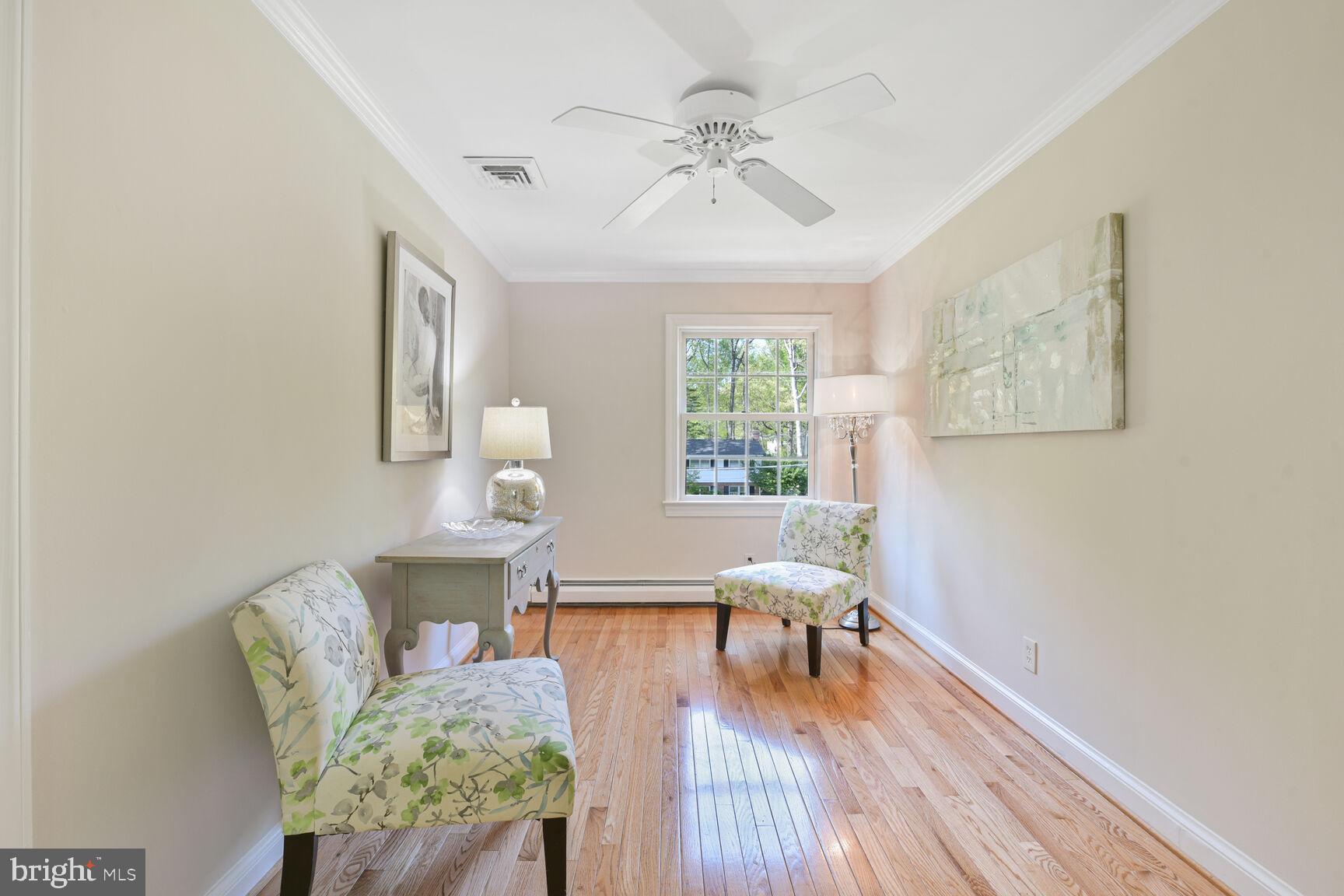 9111 Hamilton Drive Fairfax, VA 22031 - Photo 36 of 63 a living room with furniture and a wooden floor
