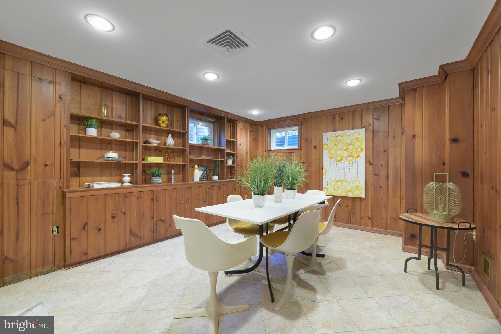 9111 Hamilton Drive Fairfax, VA 22031 - Photo 40 of 63 a view of a dining room with furniture