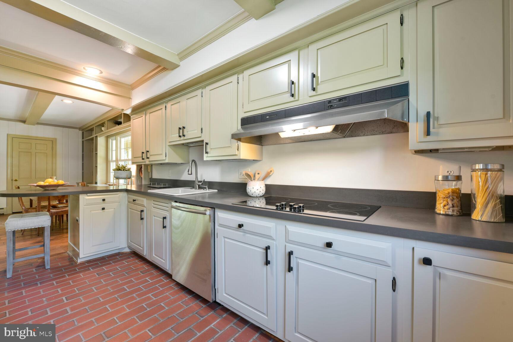 9111 Hamilton Drive Fairfax, VA 22031 - Photo 9 of 63 a kitchen with stainless steel appliances granite countertop a sink and cabinets