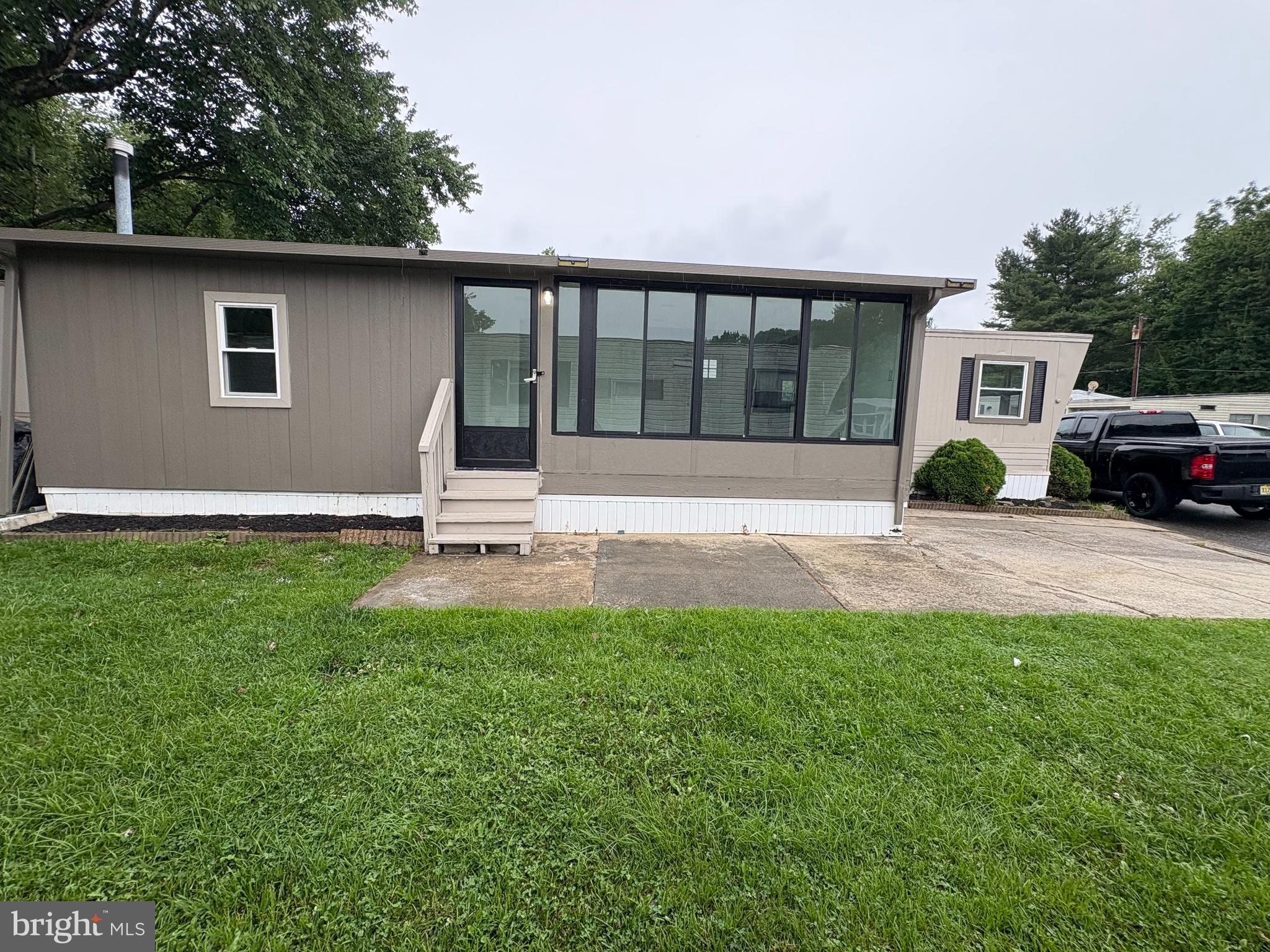 a house view with a garden space