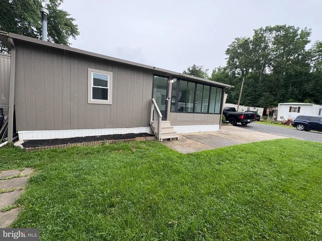 a house view with a backyard space