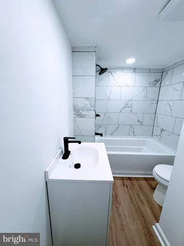 a bathroom with a sink and a toilet