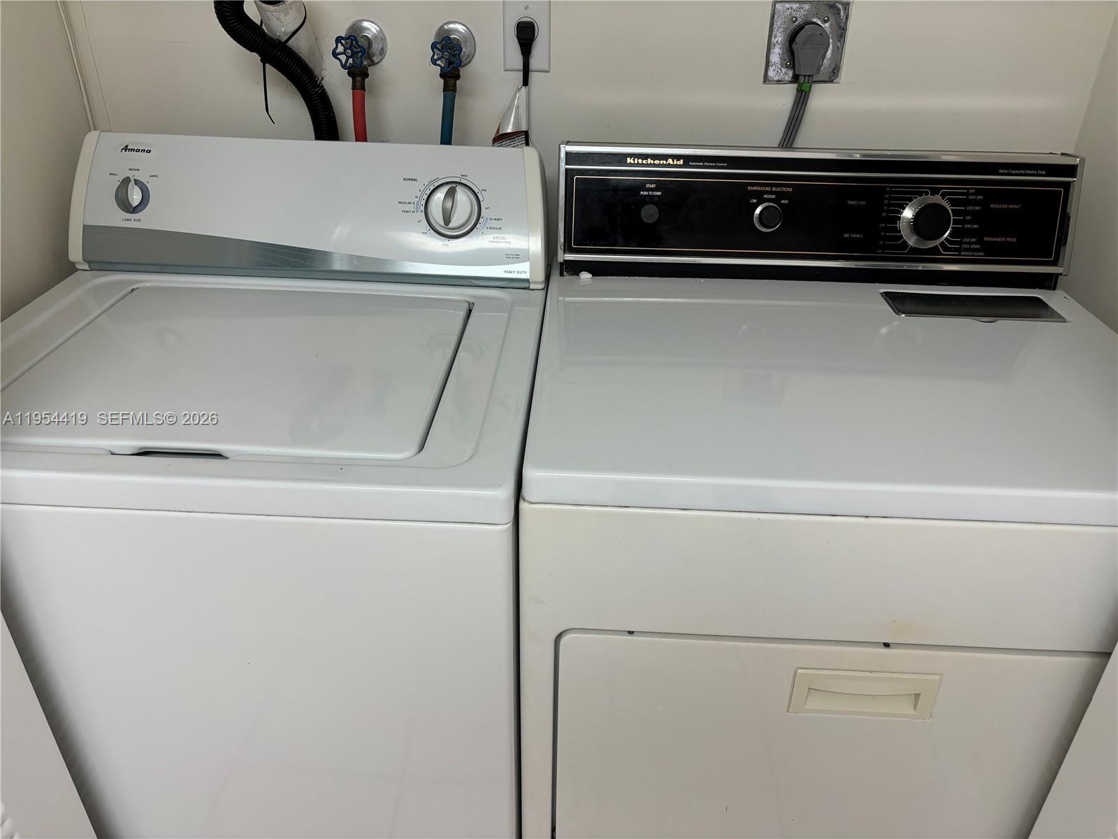11132 Southwest 153rd Court Miami, FL 33196 - Photo 14 of 33 a close view of washer and dryer