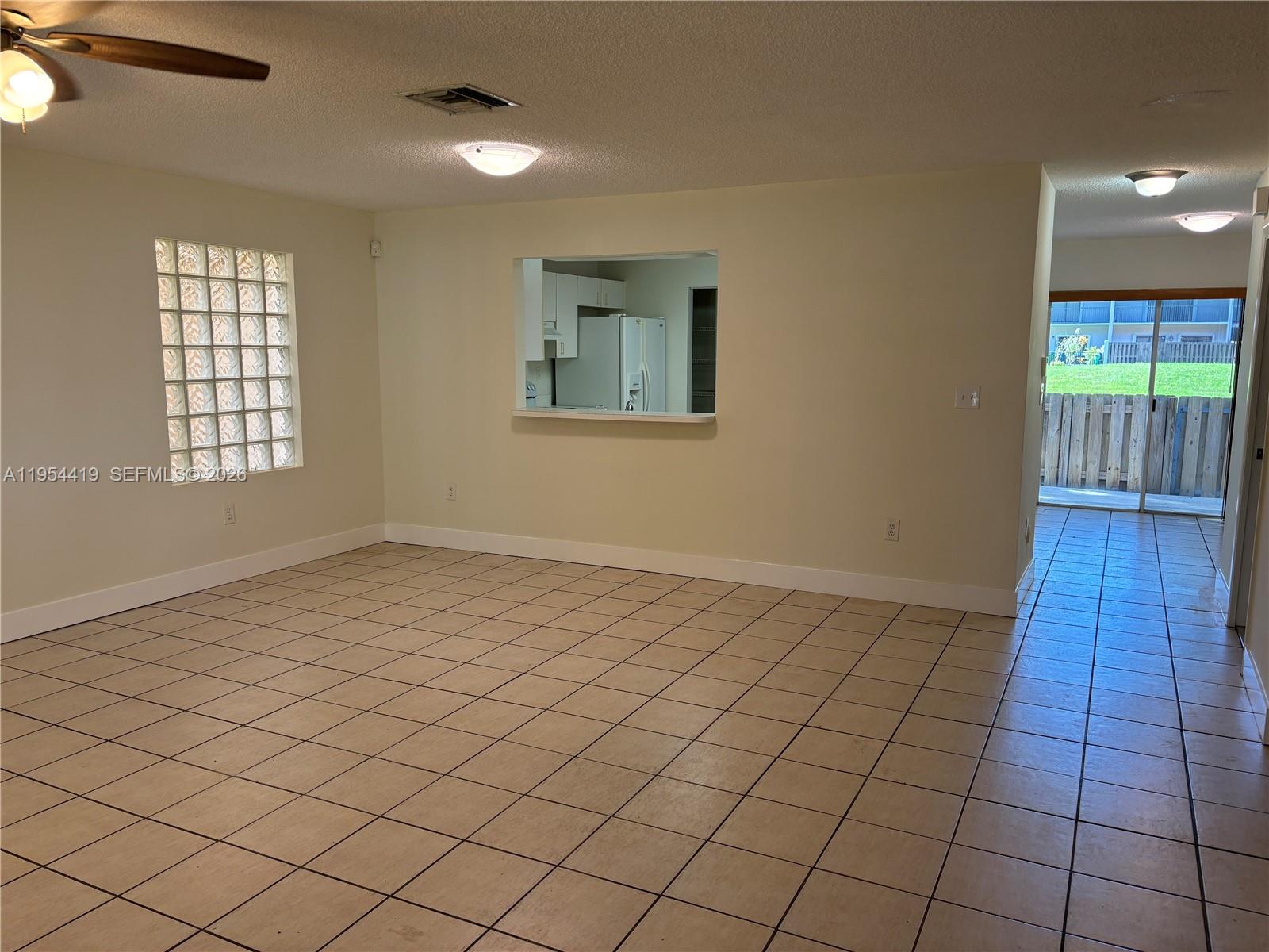 11132 Southwest 153rd Court Miami, FL 33196 - Photo 19 of 33 a view of an empty room and window