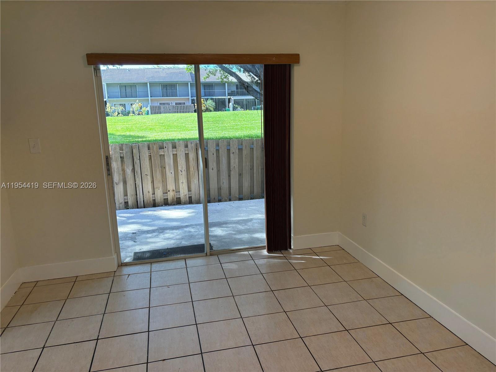 11132 Southwest 153rd Court Miami, FL 33196 - Photo 20 of 33 a view of an empty room and window