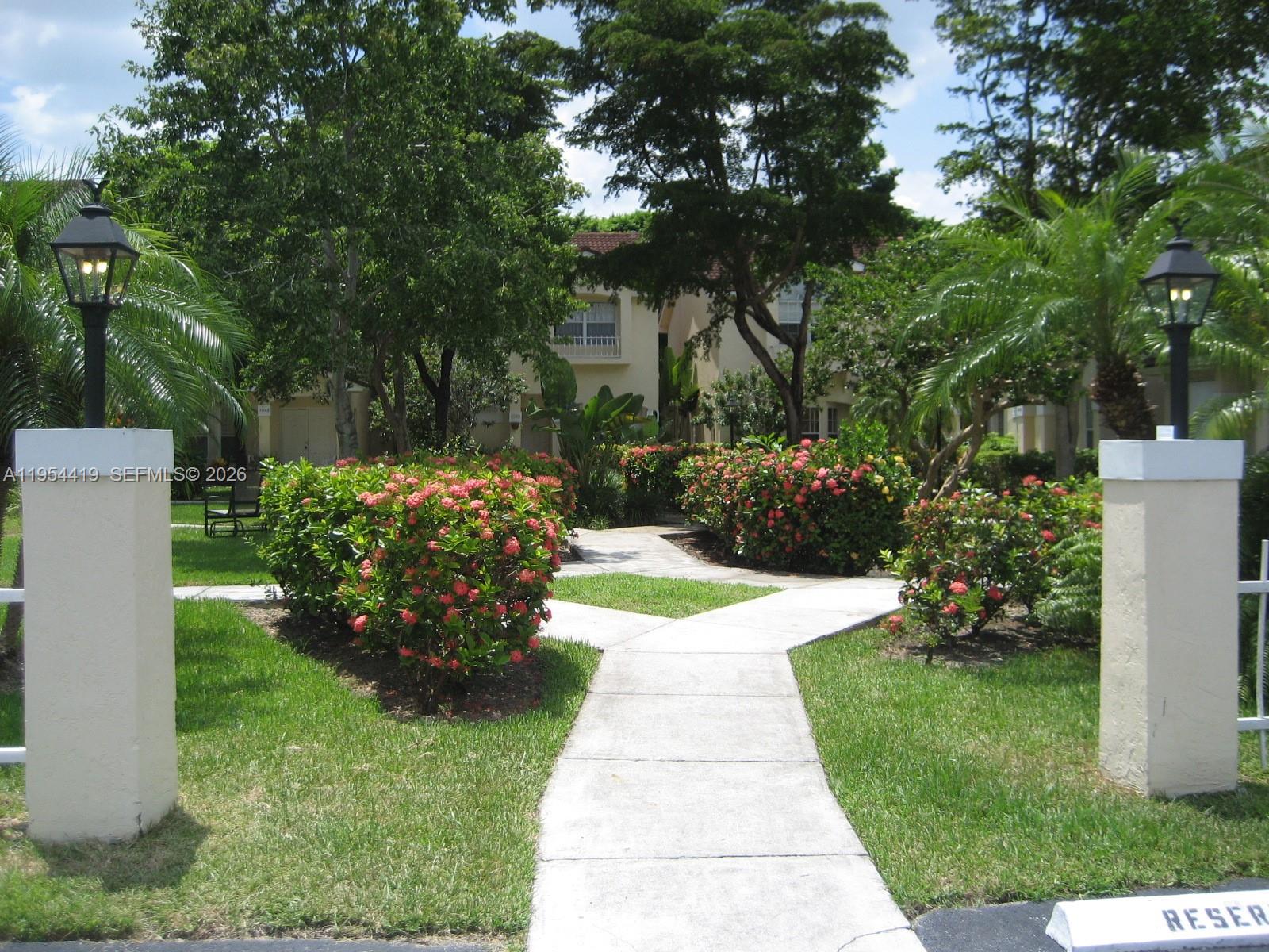11132 Southwest 153rd Court Miami, FL 33196 - Photo 28 of 33 a view of a garden with a fountain