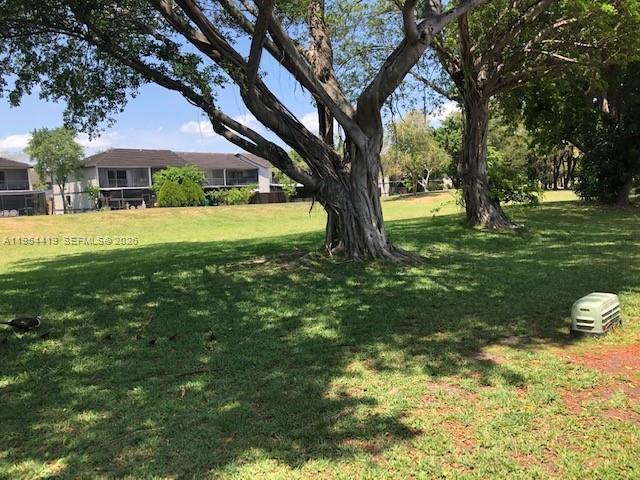 11132 Southwest 153rd Court Miami, FL 33196 - Photo 33 of 33 a front view of a house with garden