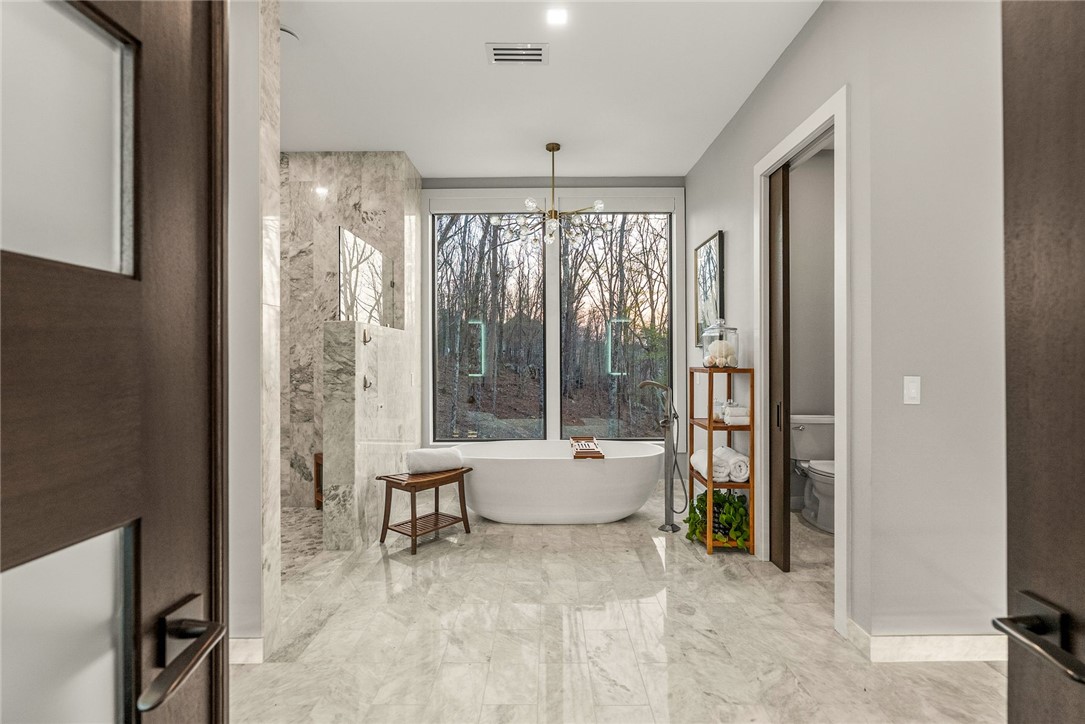 2623 Alum Cave Road Bee Branch, AR 72013 - Photo 28 of 60 Freestanding soaking tub centered before a large window