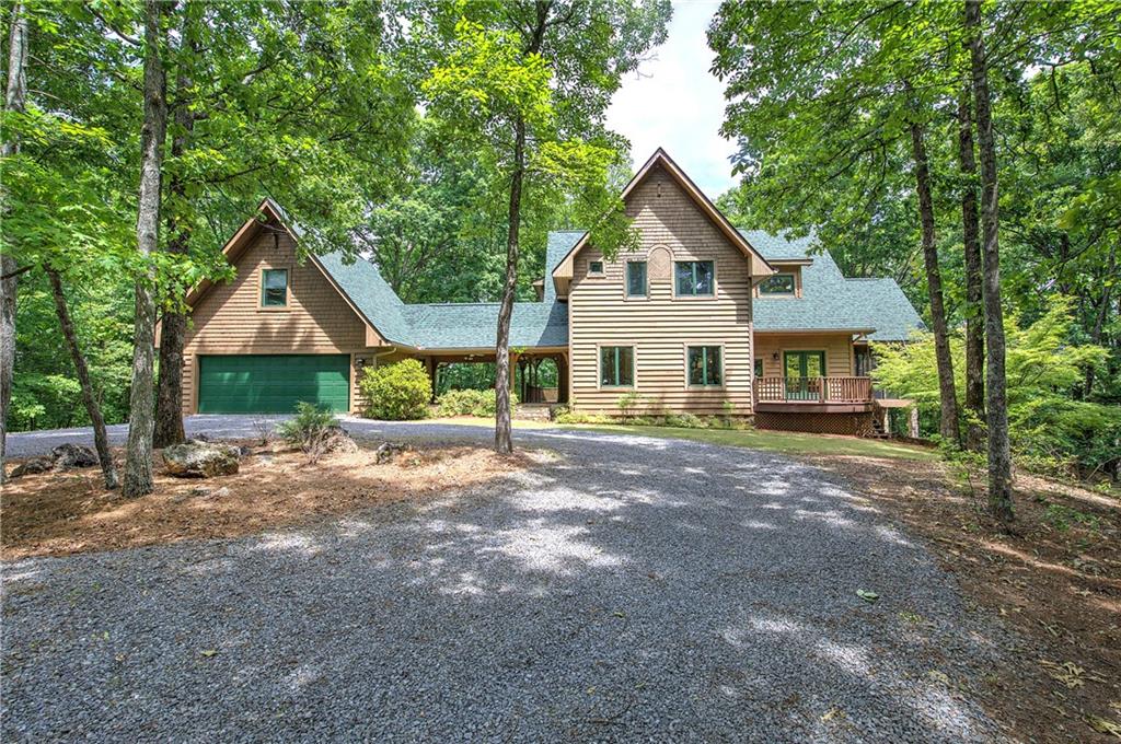 260 Road 2 S Southwest Cartersville, GA 30120 - Photo 1 of 69 a view of a house with a yard and large tree