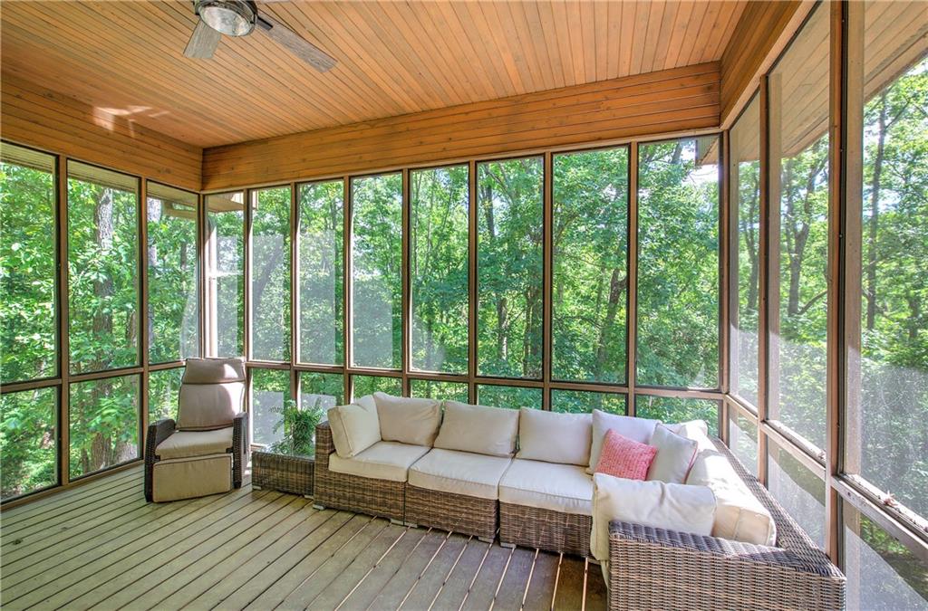 260 Road 2 S Southwest Cartersville, GA 30120 - Photo 26 of 69 a living room with furniture and a floor to ceiling window