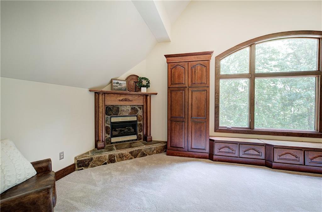 260 Road 2 S Southwest Cartersville, GA 30120 - Photo 31 of 69 a view of an empty room with fireplace and a window