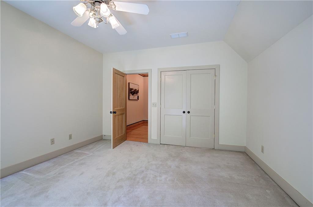 260 Road 2 S Southwest Cartersville, GA 30120 - Photo 40 of 69 a view of an empty room with a chandelier fan