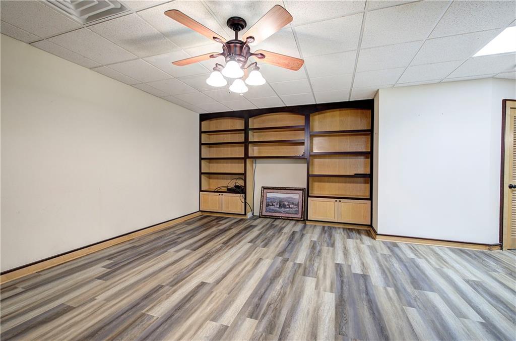 260 Road 2 S Southwest Cartersville, GA 30120 - Photo 45 of 69 a view of room with wooden floor and ceiling fan
