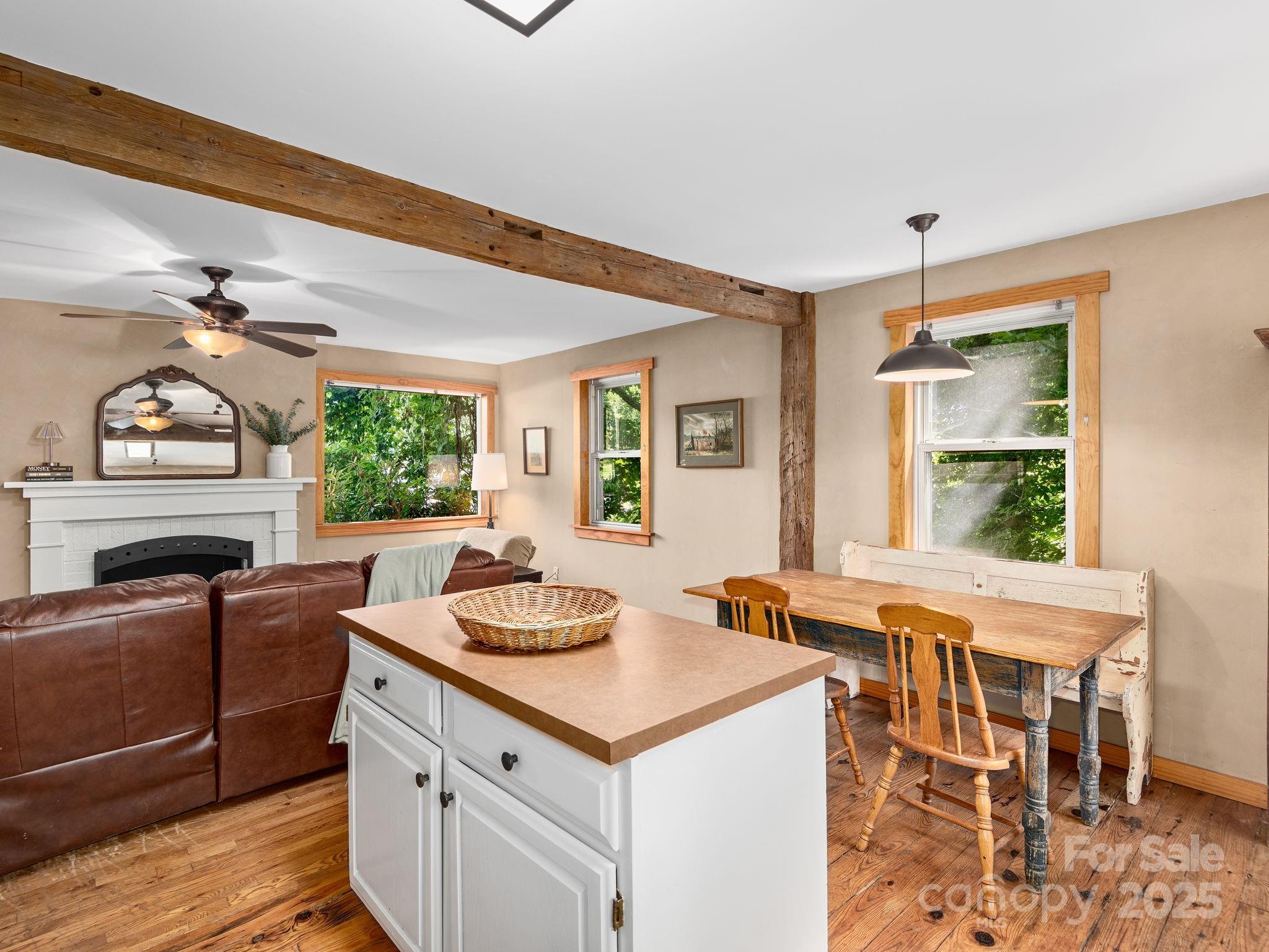 915 Tunnel Road Asheville, NC 28805 - Photo 4 of 22 a kitchen with a stove a sink and a refrigerator