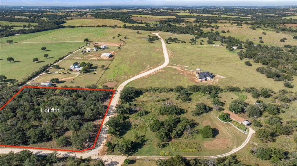 Lot #11 Trinity Ridge Drive Stephenville, TX 76401 - Photo 3 of 6 an aerial view of ocean residential house with outdoor space and trees