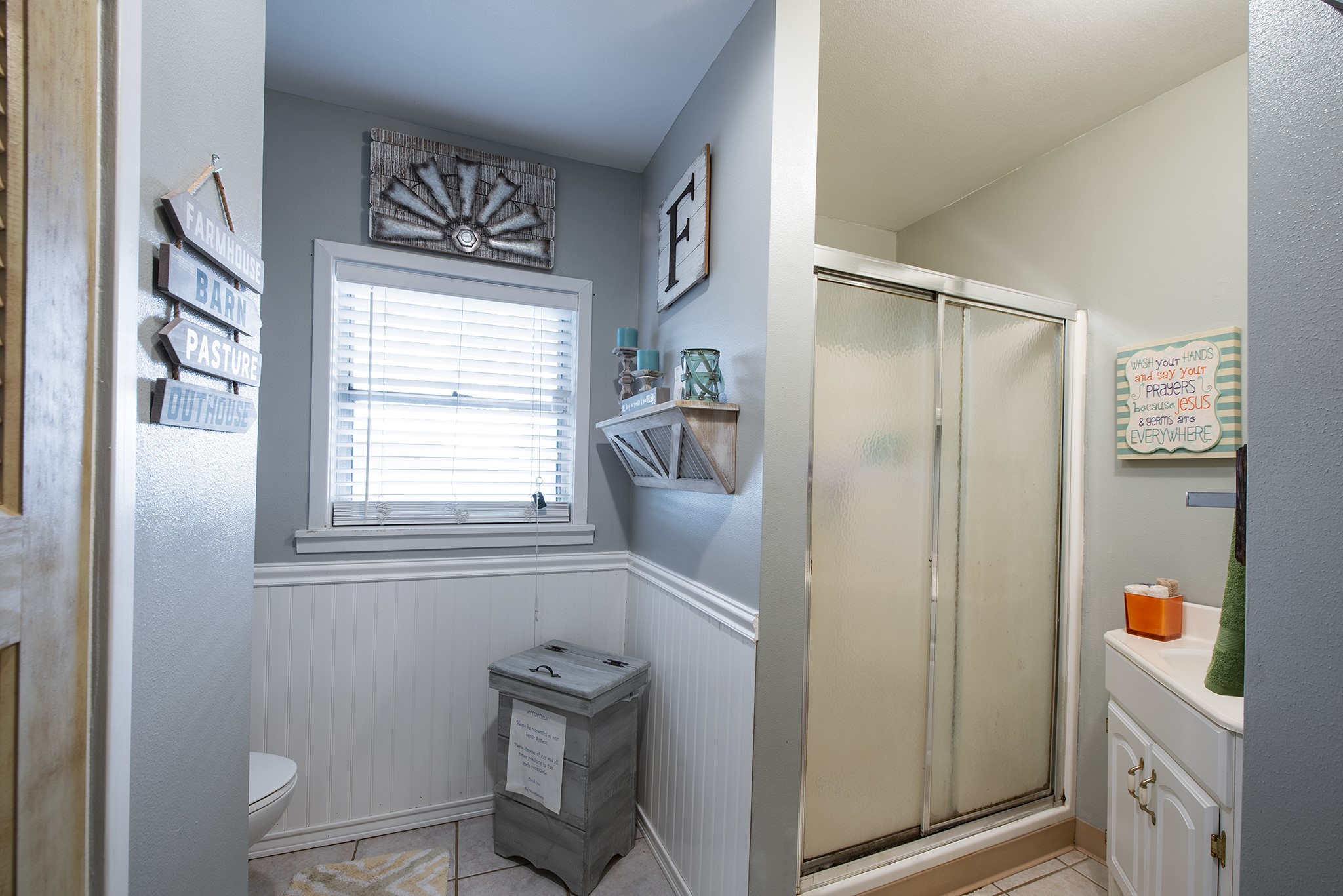 22234 Castle Road Waller, TX 77484 - Photo 32 of 50 a bathroom with a toilet and a shower