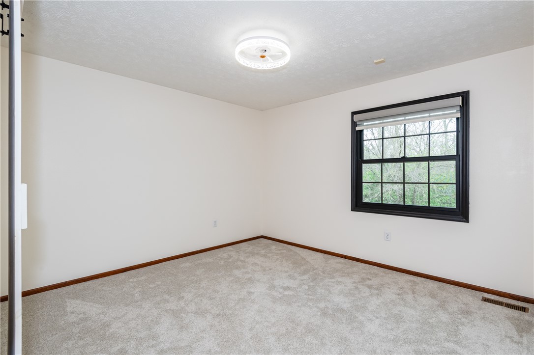6750 Little Twin Road Germantown, OH 45327 - Photo 25 of 88 This bright room features a large window, offering abundant natural light and outdoor views.