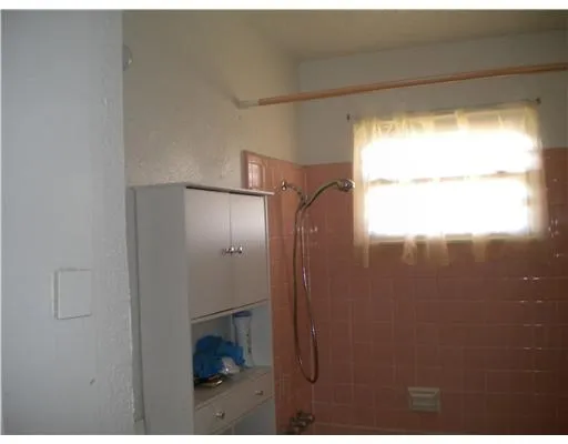 a view of yard with swimming pool