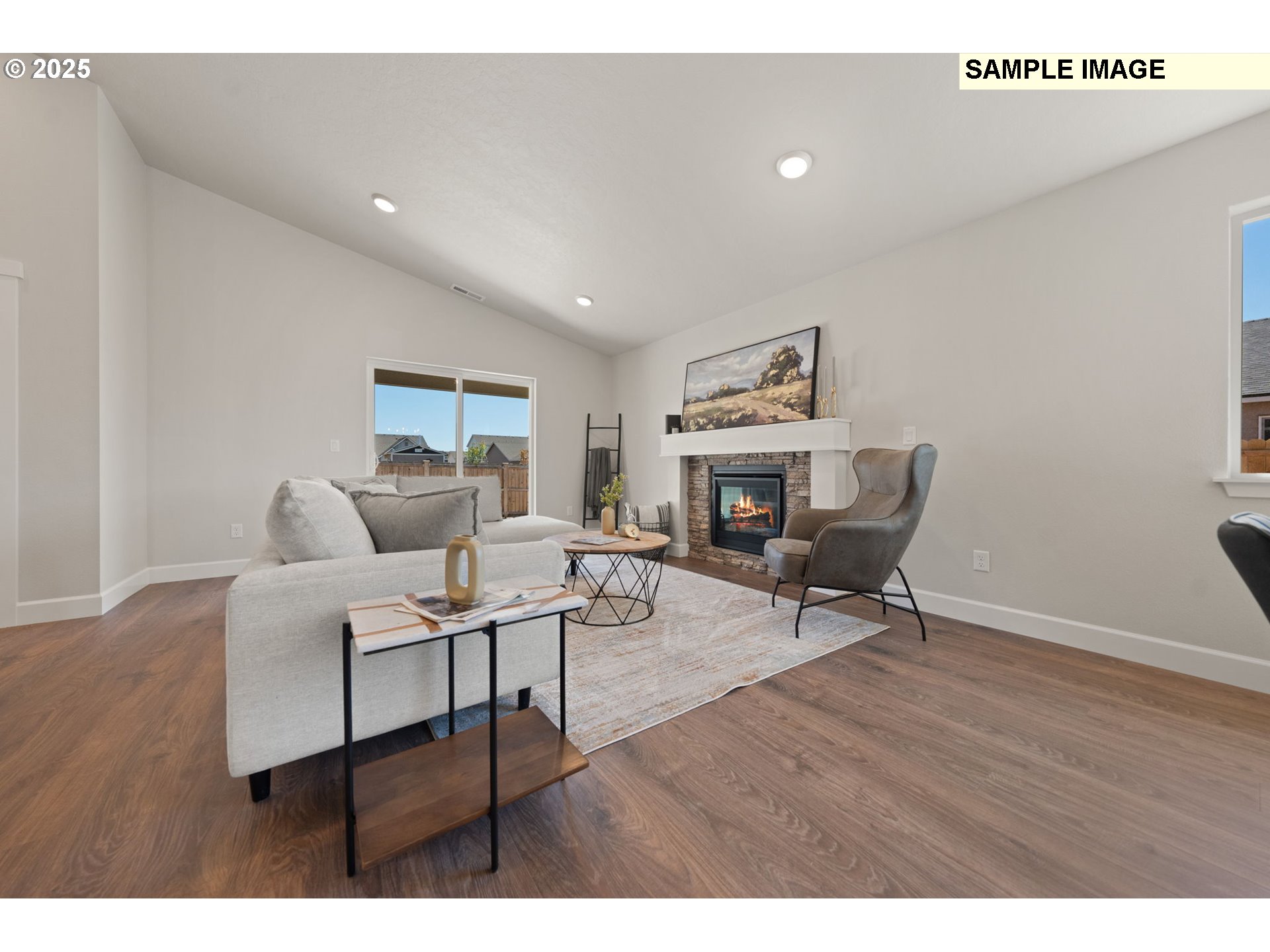 562 Taft Street Umatilla, OR 97882 - Photo 14 of 28 a living room with furniture and a wooden floor