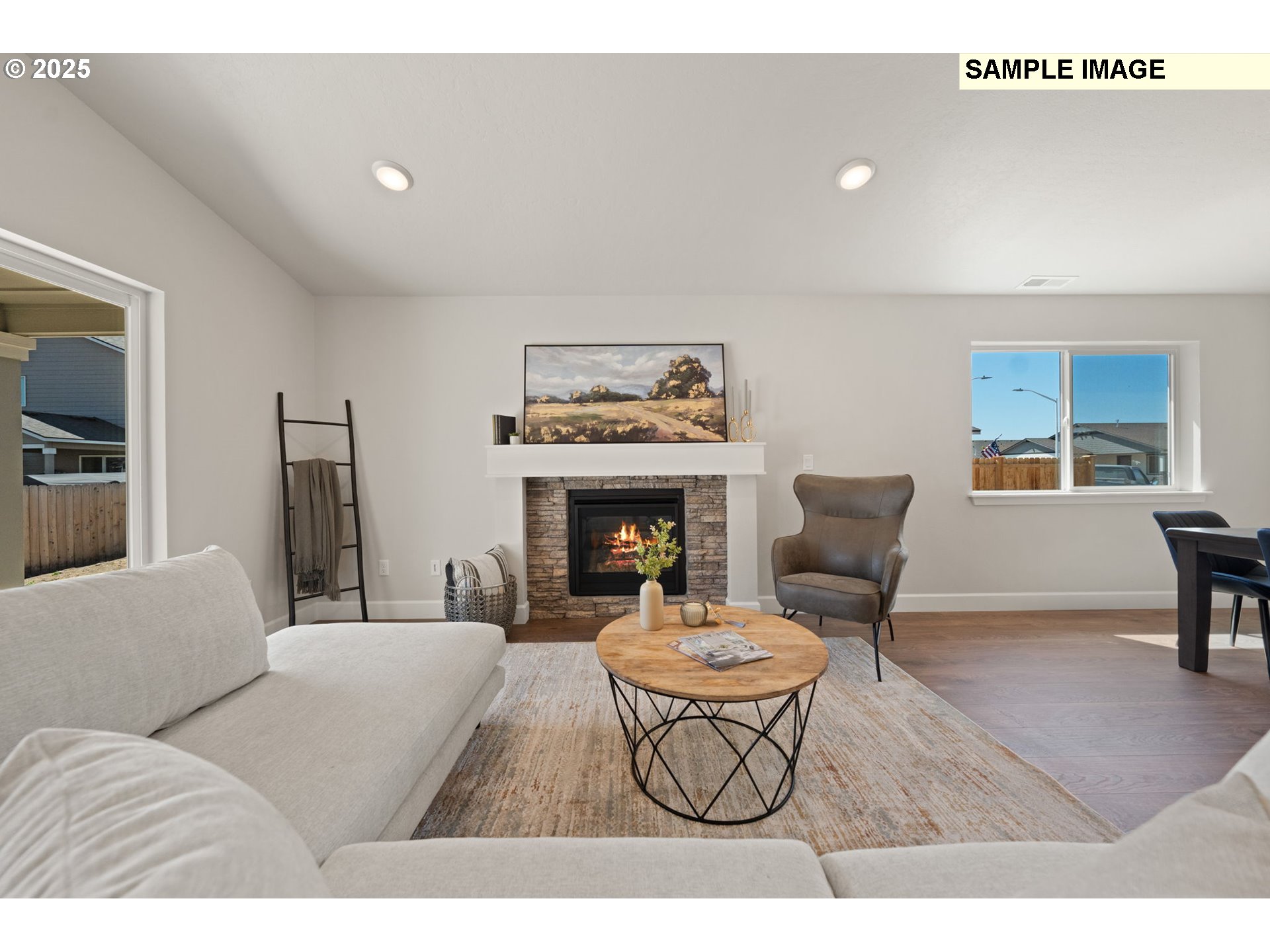 562 Taft Street Umatilla, OR 97882 - Photo 15 of 28 a living room with furniture and a fireplace