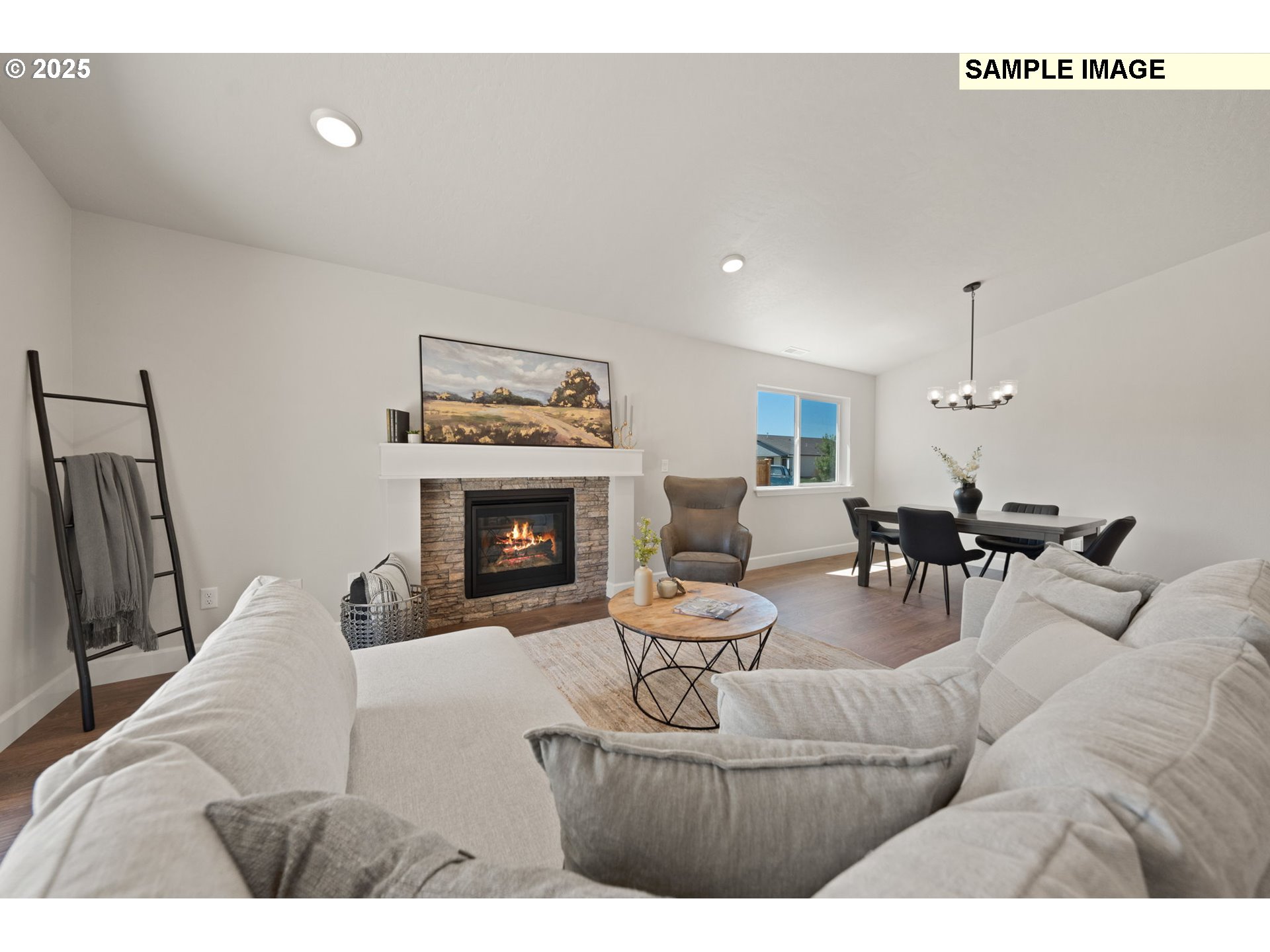 562 Taft Street Umatilla, OR 97882 - Photo 16 of 28 a living room with furniture and a fireplace