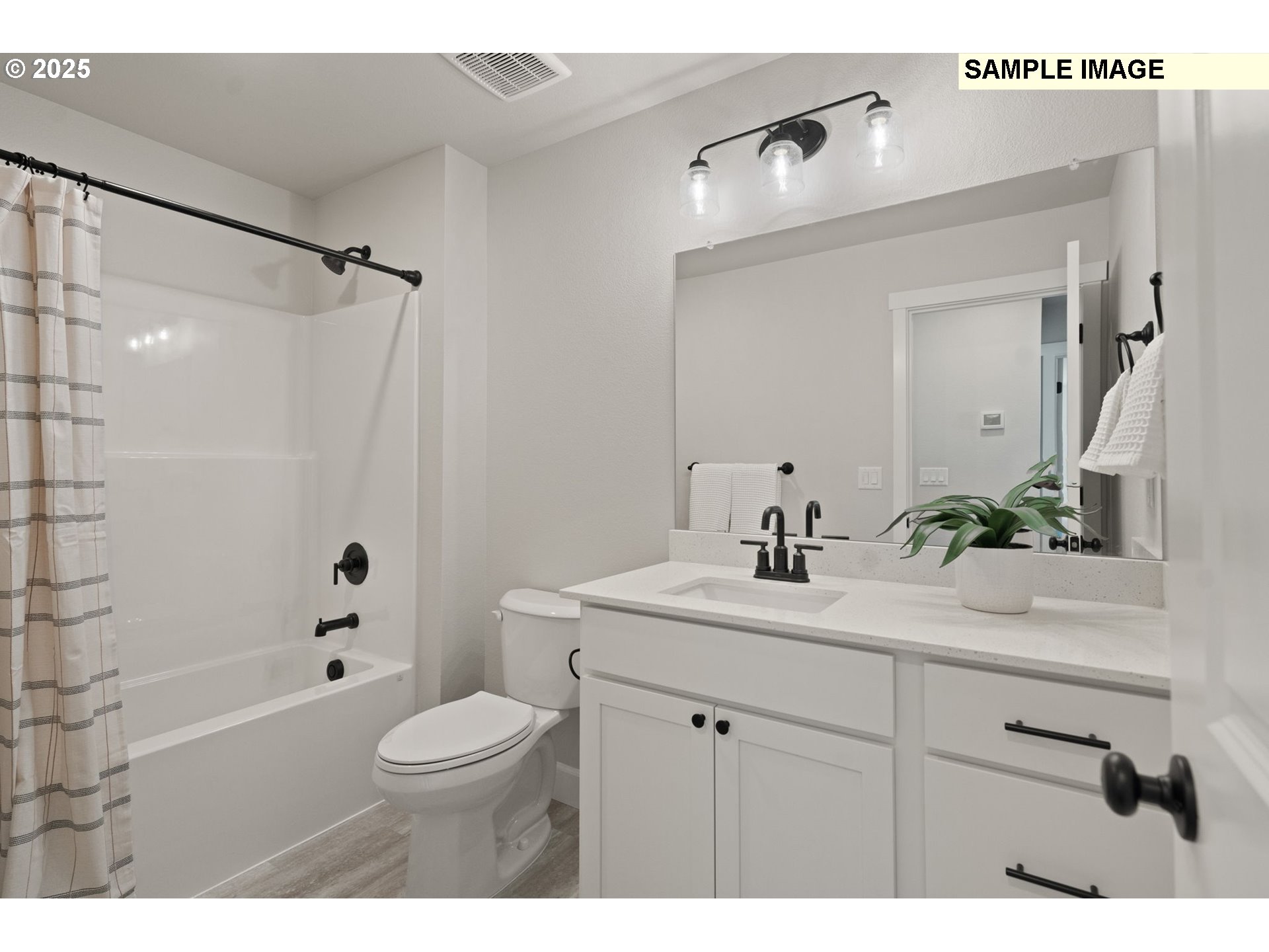 562 Taft Street Umatilla, OR 97882 - Photo 27 of 28 a bathroom with a sink a toilet and shower