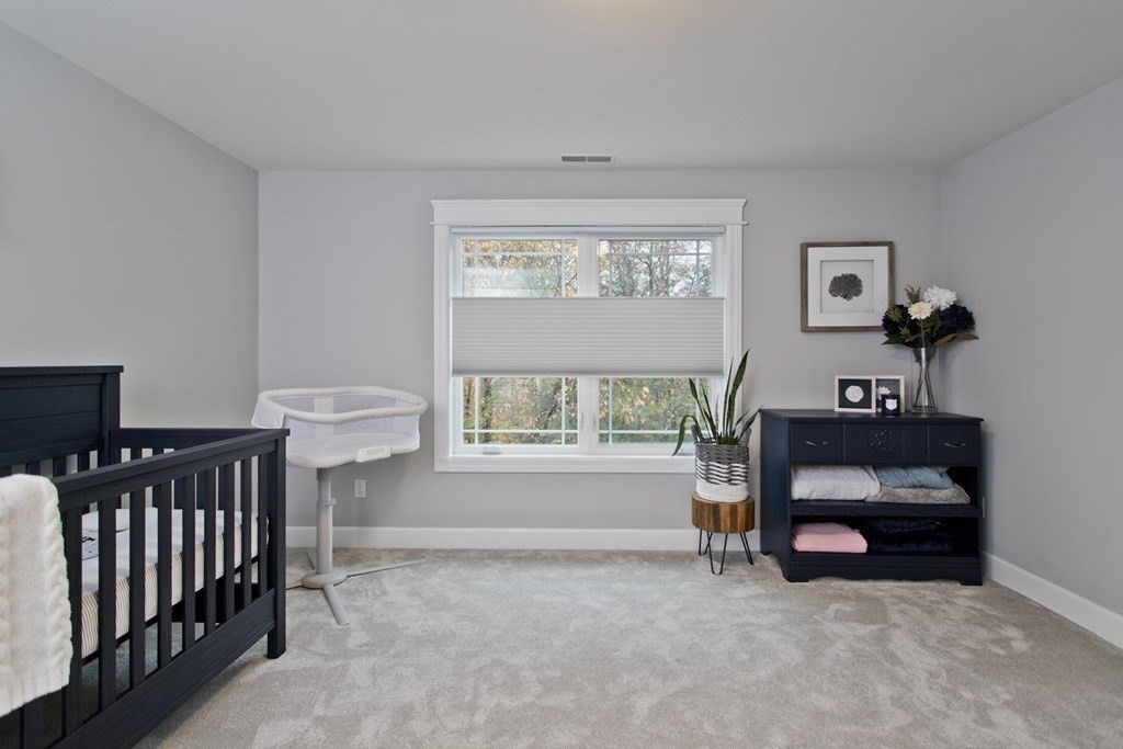 102 Linden Ridge Road Amherst, MA 01002 - Photo 32 of 42 a living room with furniture and a window