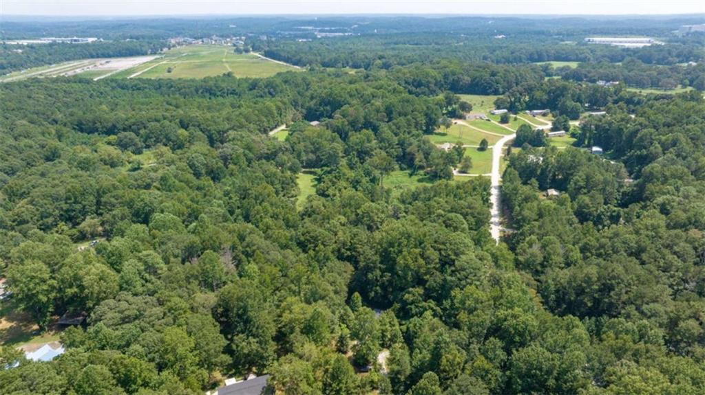 126 Loggins Trail Commerce, GA 30529 - Photo 42 of 50 an aerial view of a city with lots of residential buildings