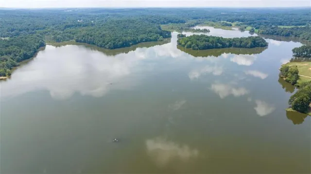 a view of a lake with a city