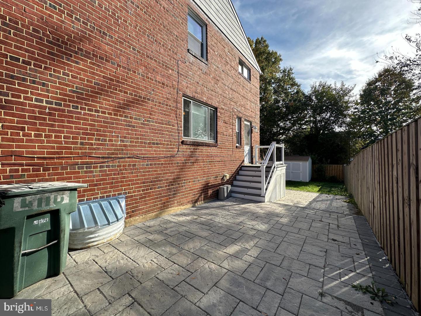 4116 Duke Street Alexandria, VA 22304 - Photo 15 of 16 a view of house with backyard and sitting area
