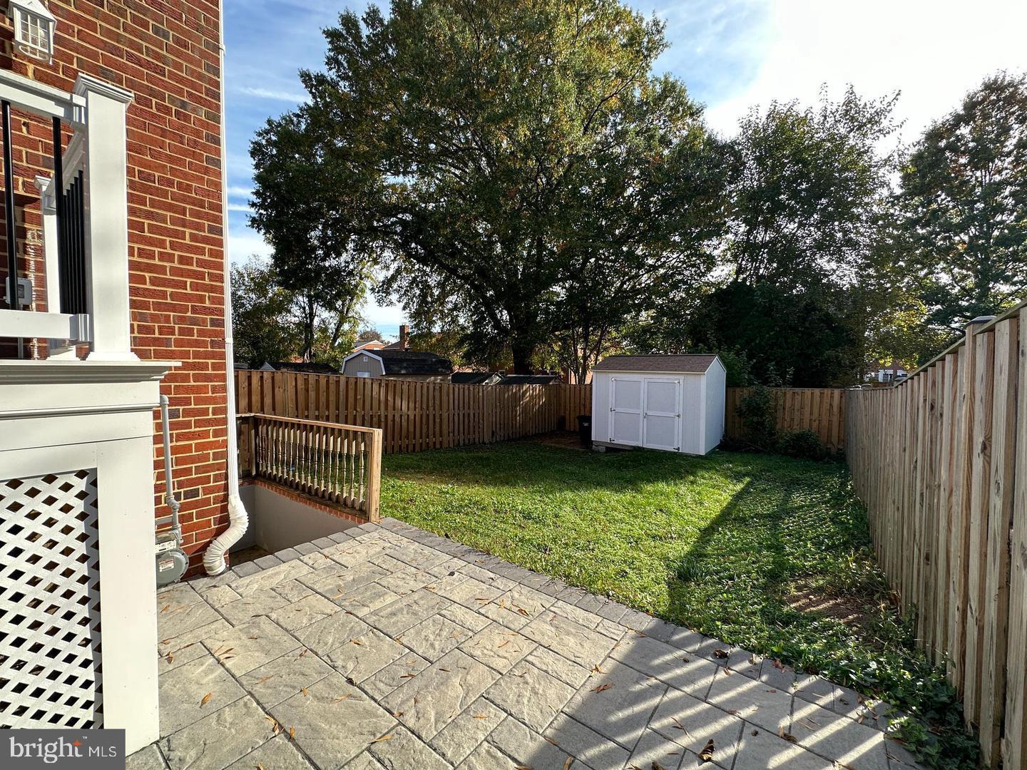 4116 Duke Street Alexandria, VA 22304 - Photo 16 of 16 a garden view with a pathway