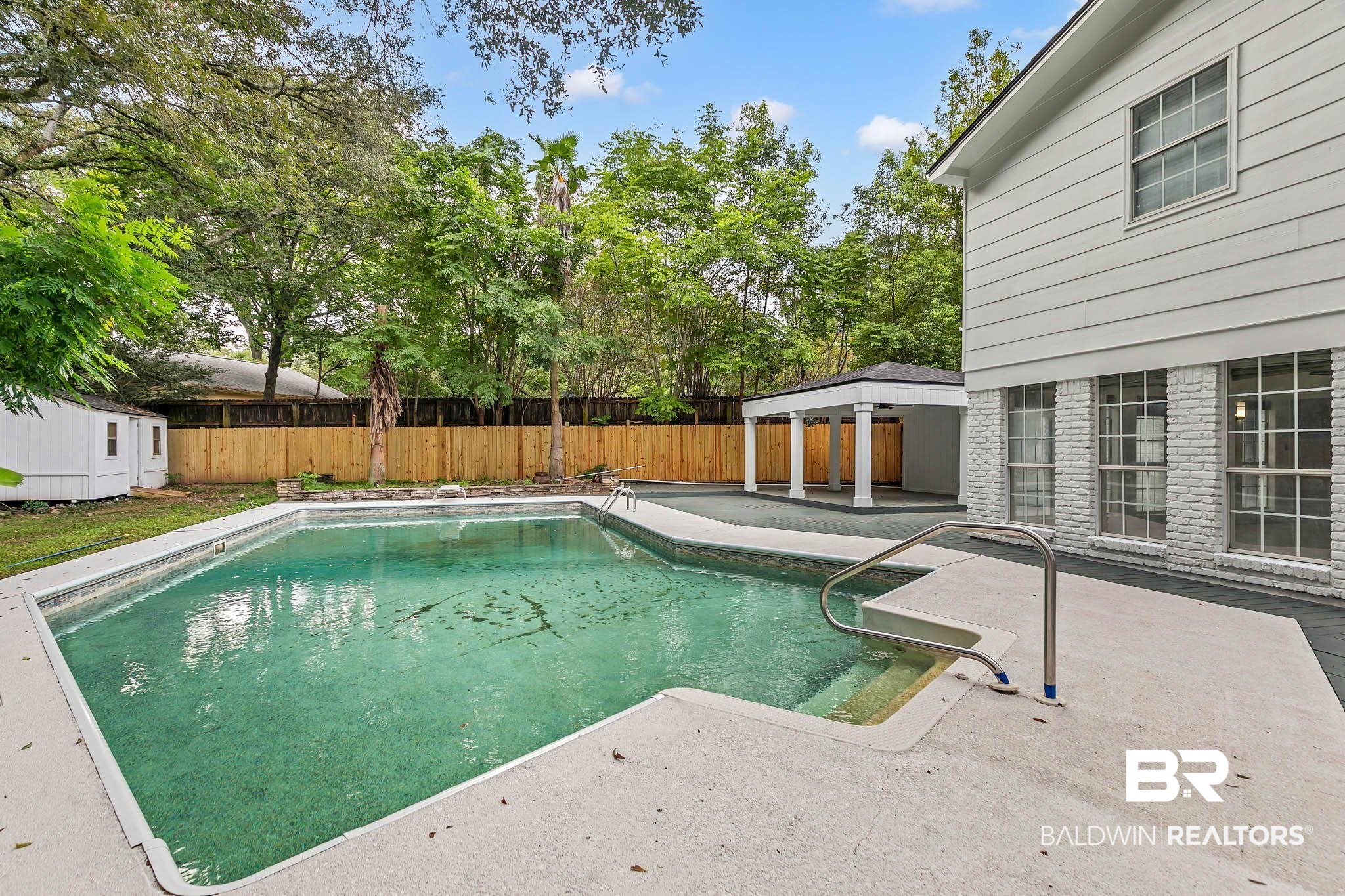 4705 Sherry Court Mobile, AL 36693 - Photo 72 of 100 View of swimming pool featuring a gazebo, a patio, a shed, and a fenced backyard