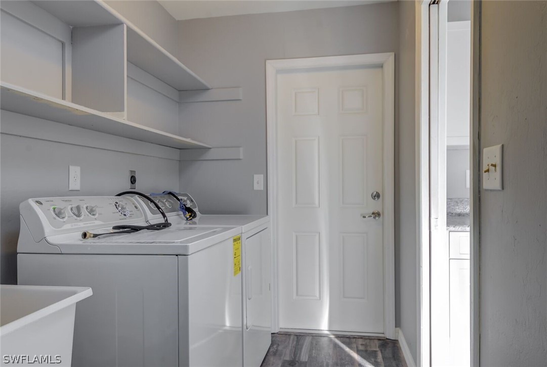 18485 Sebring Road Fort Myers, FL 33967 - Photo 20 of 21 a utility room with dryer and washer