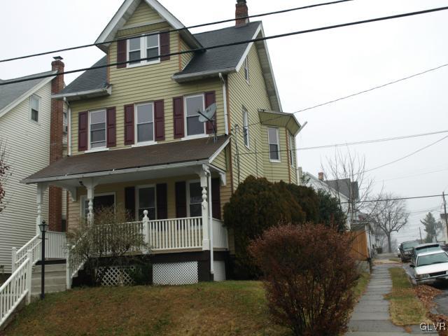 702 Spring Street Bethlehem, PA 18018 - Photo 1 of 17 a view of a brick house with many windows