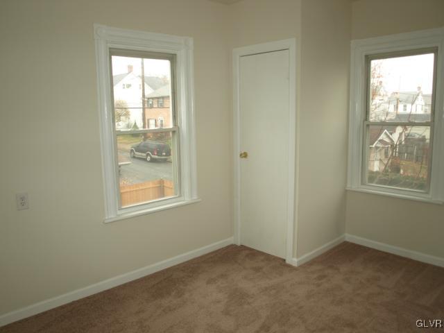 702 Spring Street Bethlehem, PA 18018 - Photo 8 of 17 an empty room with windows
