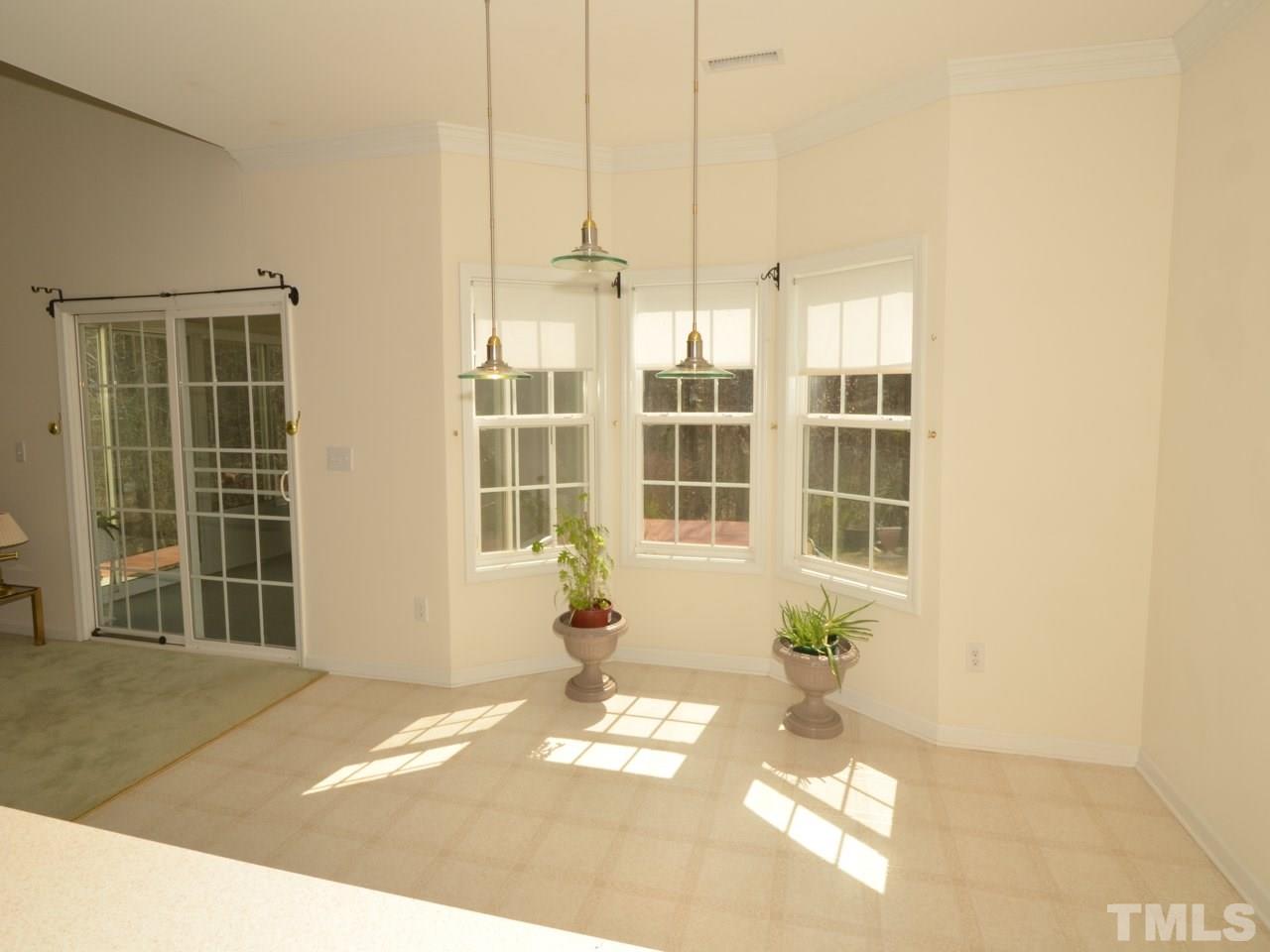 335 Inkster Cove Raleigh, NC 27603 - Photo 7 of 25 a view of a room with windows