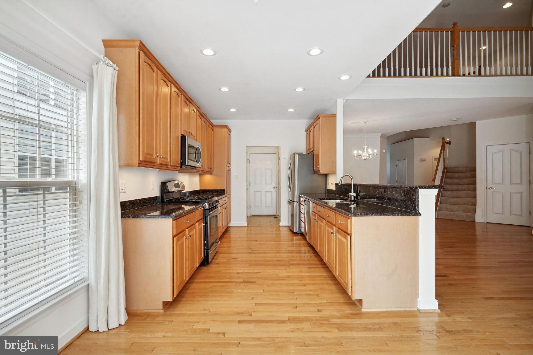 13037 Ormond Drive Bristow, VA 20136 - Photo 11 of 36 View from breakfast room towards the garage.