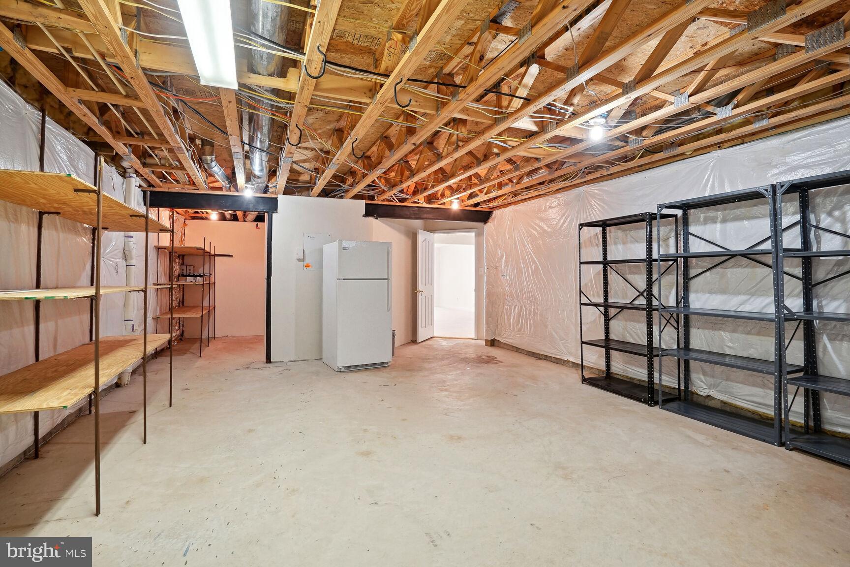 13037 Ormond Drive Bristow, VA 20136 - Photo 25 of 36 Plenty of storage & shelving in the basement.