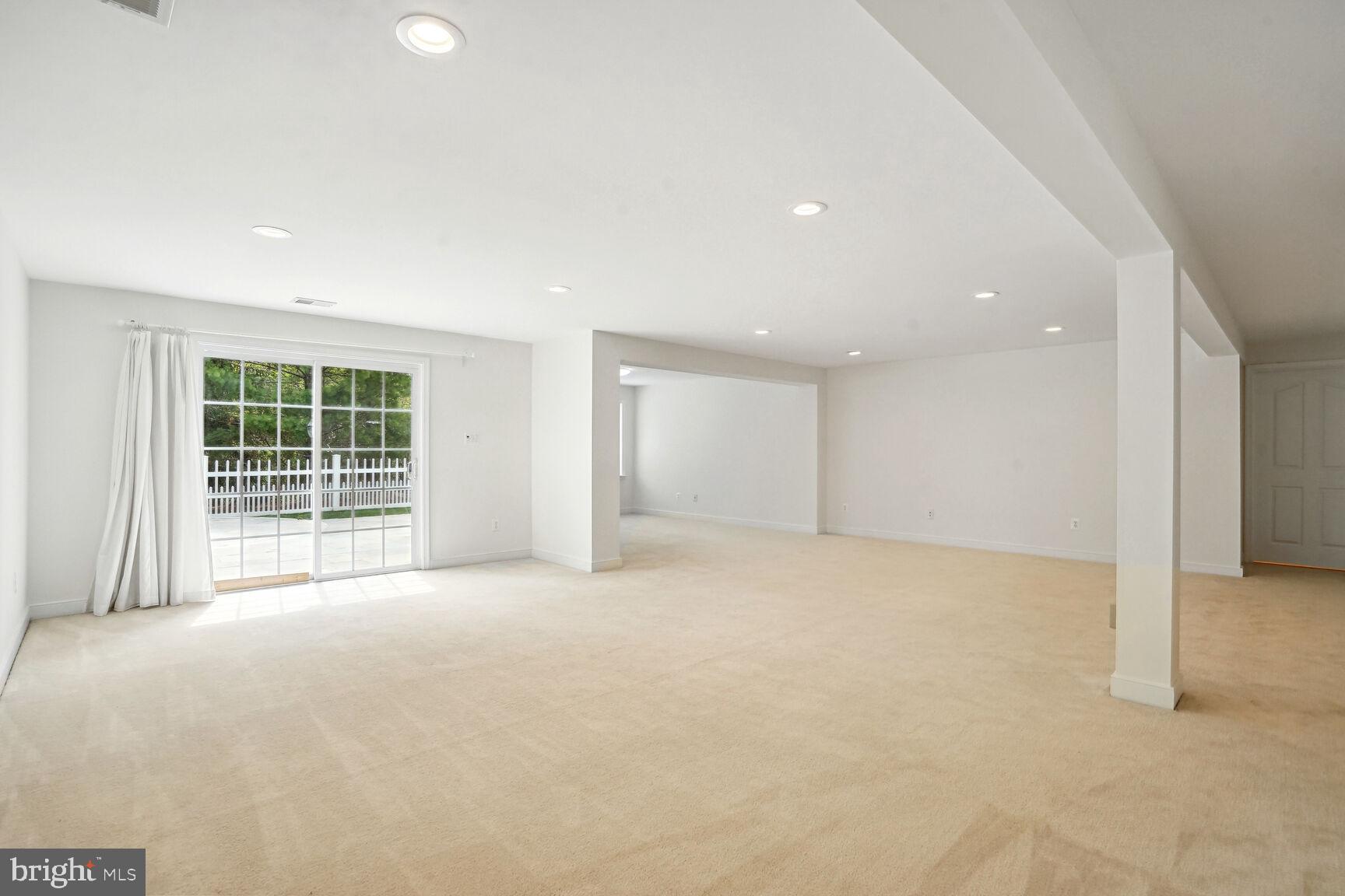 13037 Ormond Drive Bristow, VA 20136 - Photo 26 of 36 Sliding glass door to a gorgeous stone patio.