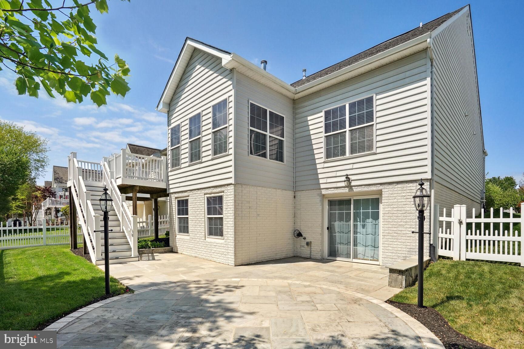 13037 Ormond Drive Bristow, VA 20136 - Photo 27 of 36 Stone patio is great for entertaining or relaxing.