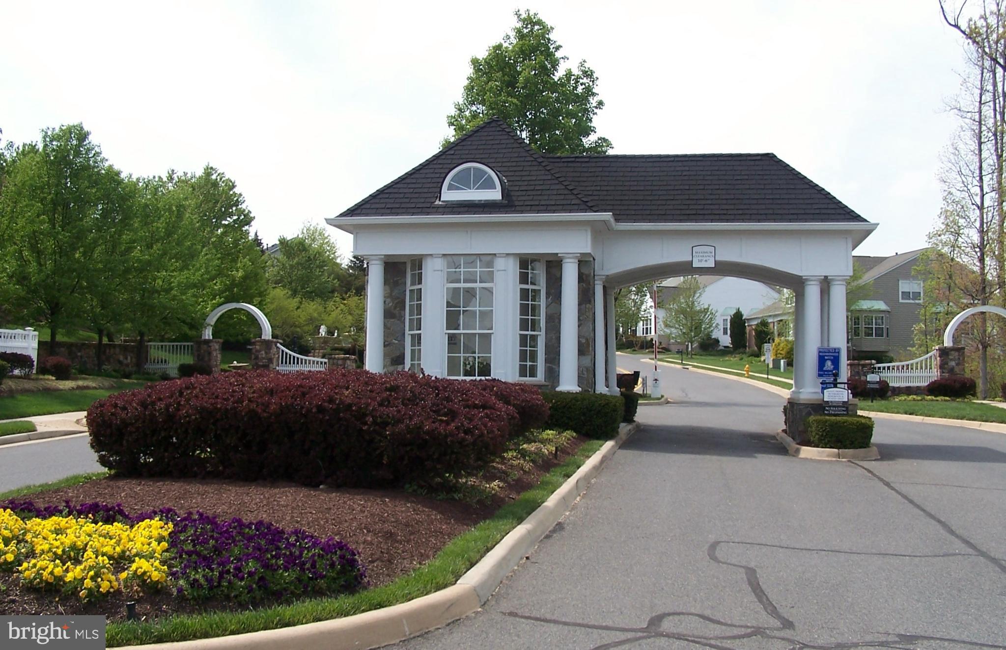 13037 Ormond Drive Bristow, VA 20136 - Photo 32 of 36 Entrance gate off Sudley Manor Drive.