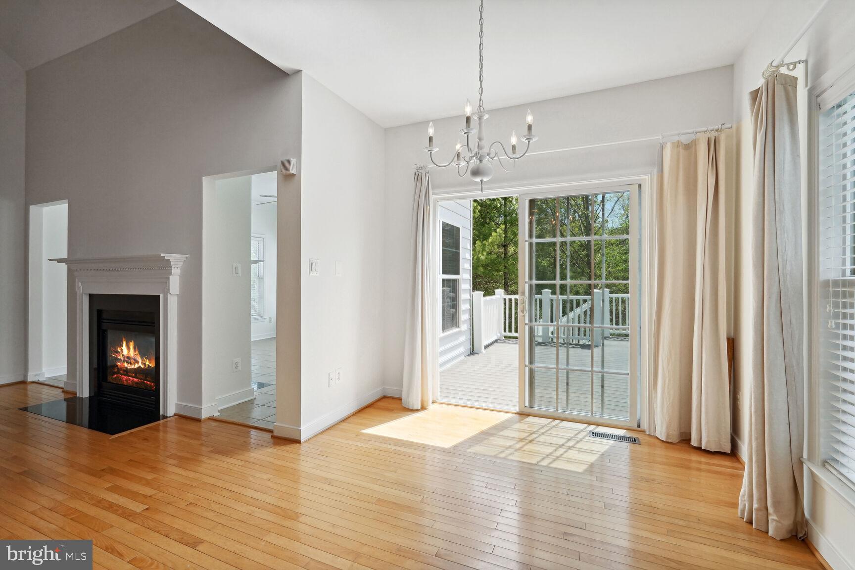 13037 Ormond Drive Bristow, VA 20136 - Photo 8 of 36 Breakfast area with sliding glass door to deck.