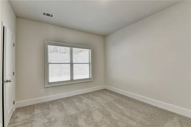 a view of a hallway with closet