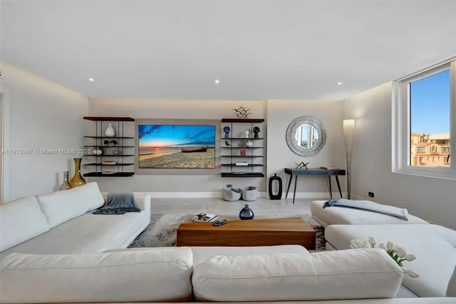 a living room with furniture and a table