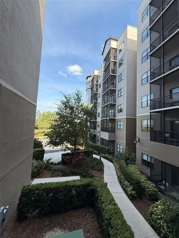 a view of swimming pool from a balcony