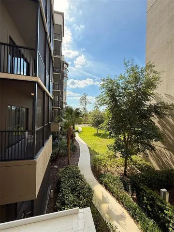 a view of a garden with houses